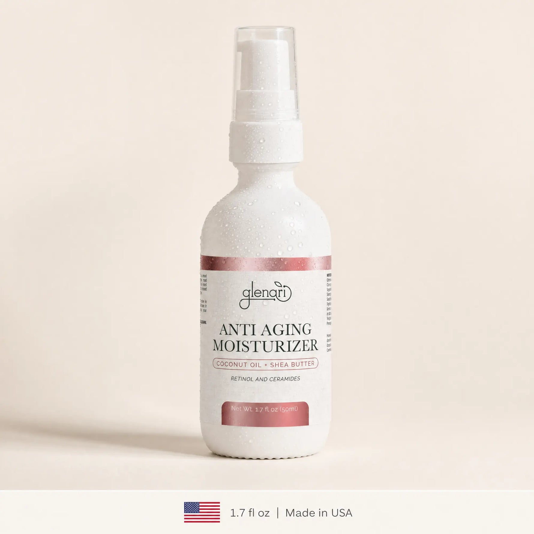A white spray bottle of Glenari Anti-Aging Moisturizer with a clear cap, set against a warm beige background. The bottle features a white label with dusty rose accents and condensation droplets.