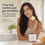 A woman in a kitchen setting holds a small yellow hair strip while a tin of hair strips sits on the counter in front of her. Text on the left reads, 'Your hair routine just got portable.