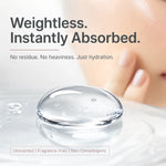 A close-up skincare ad showing a clear gel droplet on wet skin with large text reading 'Weightless. Instantly Absorbed.