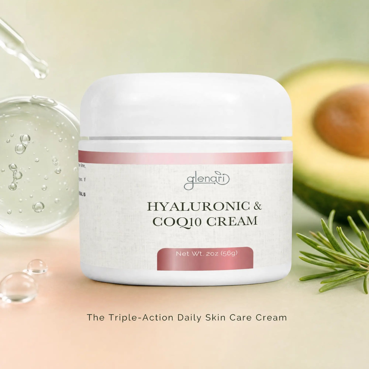 A white cosmetic jar labeled 'glenu HYALURONIC & COQ10 CREAM' centered on a soft peach background, with decorative skincare props including a glass dropper, clear gel, avocado, and rosemary sprig.