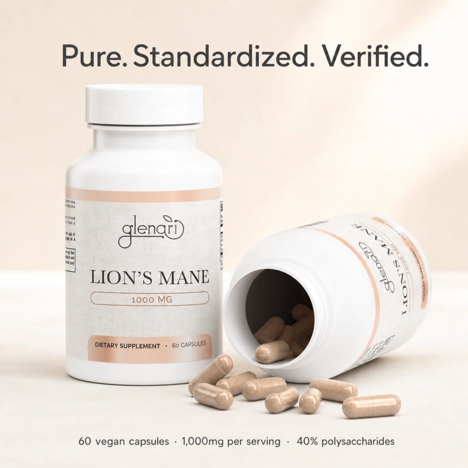 A white bottle of Glenari Lion's Mane dietary supplement with one tipped-over bottle and scattered beige capsules on a light beige background. Text above reads 'Pure. Standardized. Verified.'