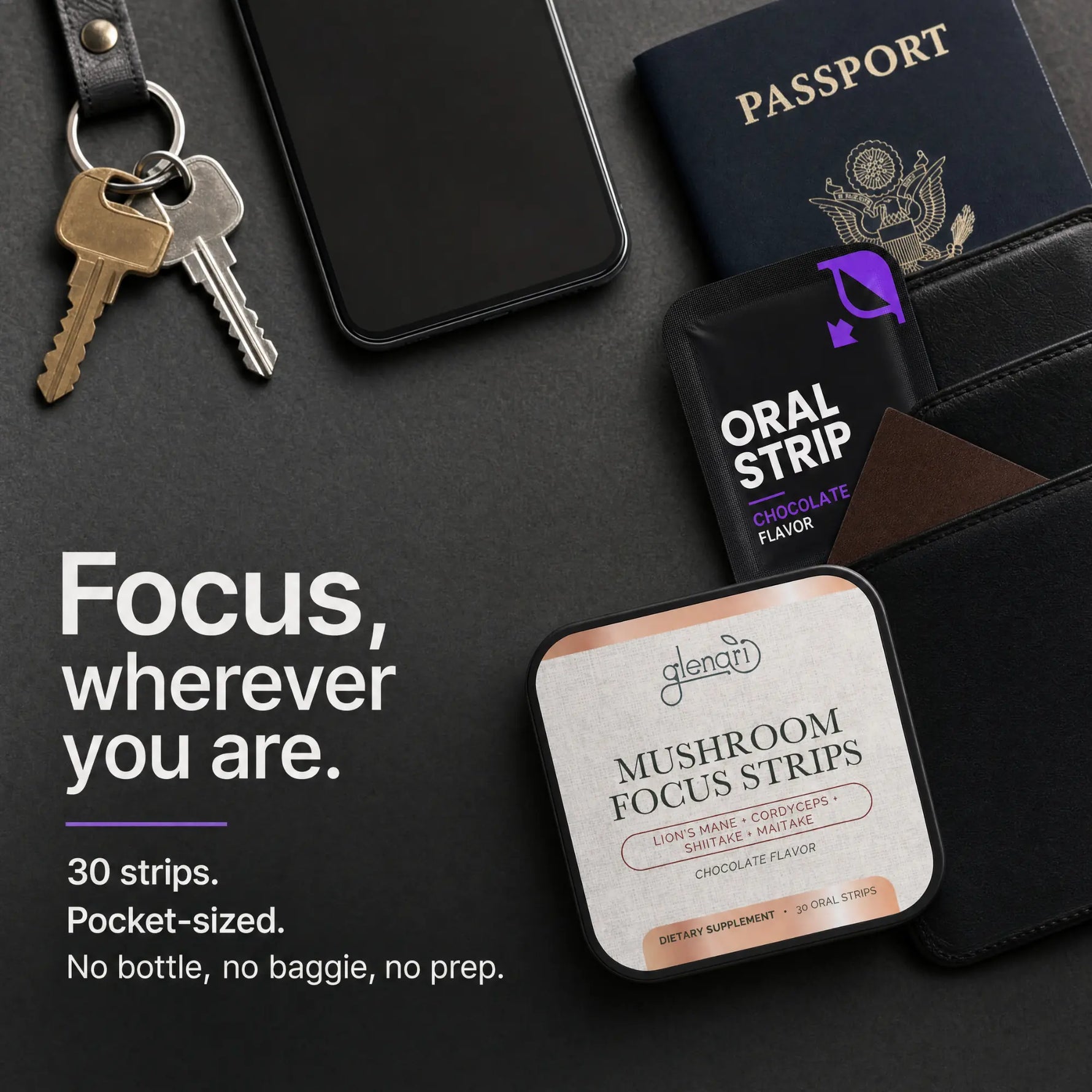 A flat-lay product shot of Glenari Mushroom Focus Strips in a pocket-sized square tin, surrounded by lifestyle props including a passport, wallet, keys, and phone on a dark textured background. Text on the left reads 'Focus, wherever you are.