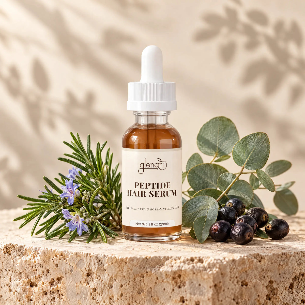Glenari Peptide Hair Serum premium glass dropper bottle with natural rosemary and eucalyptus elements.
