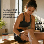 A woman in a gym setting applies white recovery cream to her leg while sitting on a wooden bench. A jar of Glenari recovery cream is shown in the foreground, with text on the left reading 'Recovery that actually works — without the chemical smell.