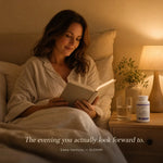 A woman in white pajamas sits in bed reading a book in a warmly lit bedroom. A bedside table holds a lit lamp, a glass of water, and a white supplement bottle labeled Sleep Harmony by GLENARI.