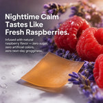 A close-up product shot of a translucent amber gummy or resin swatch placed on a white surface with water droplets, surrounded by fresh raspberries and purple lavender flowers. Large text on the left reads, 'Nighttime Calm Tastes Like Fresh Raspberries.