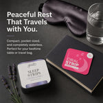 A sleep aid product arrangement on a dark tabletop: a small round tin labeled 'Glenari Sleep Strips' sits beside a black notebook with a bright pink 'Oral Strip' insert, a dark satin sleep mask, a glass of water, and lavender sprigs. Large text reads, 'Peaceful Rest That Travels With You.'